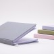 Business notebook with business card pocket on the cover, elastic pen holder, and acid-free paper with printed inner pages