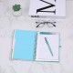 A5 spiral-bound notebook with gold double-ringed paper cover, printed envelope, and storage bag. A5 spiral-bound notebook with gold double-ringed paper cover, printed envelope, and storage bag.